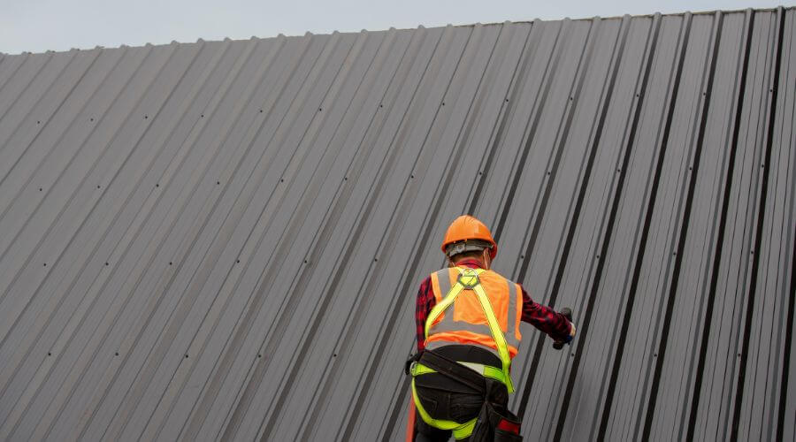 Professional metal roof installation services in Burt, MI